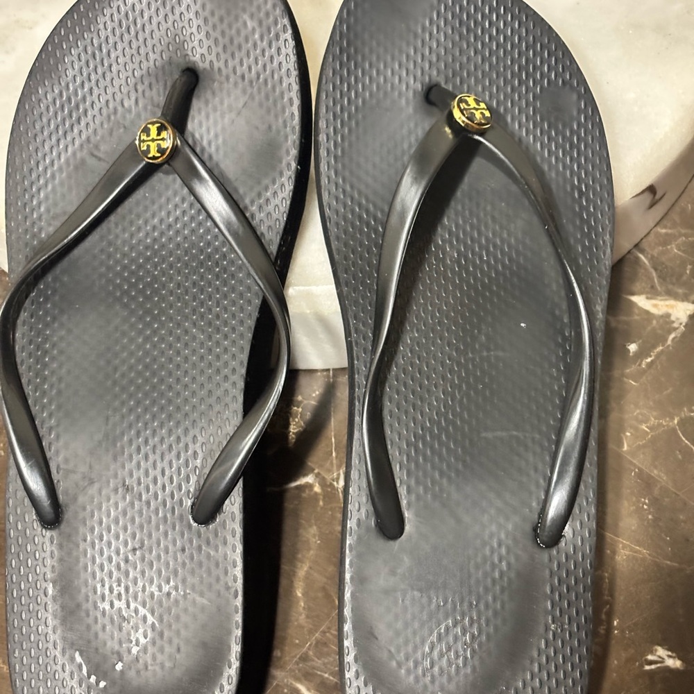 Tory Burch Black and Gold Flip Flops